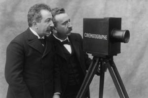 Lumière Brothers with the Cinématographe, first motion picture projector, 1895